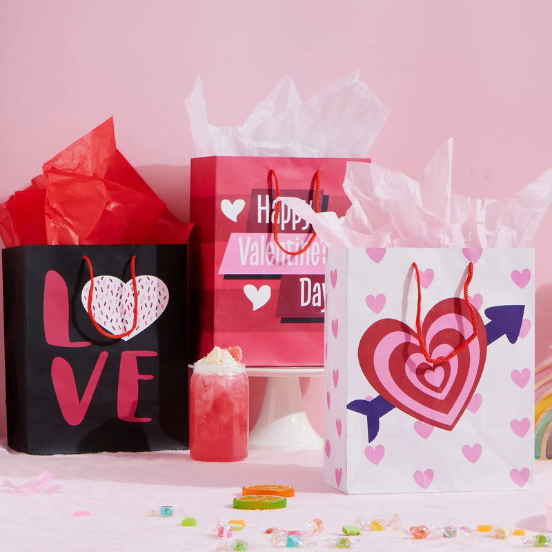 8Pcs Paper Gift Bags with Filing Paper for Valentines Day in 4 Designs for Kids